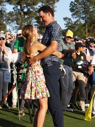 Scottie Scheffler of the US reacts with his wife Meredith on the eighteenth hole after winning the 2022 Masters Tournament at the Augusta National Golf Club in Augusta, Georgia, USA, 10 April 2022. The 2022 Masters Tournament is held 07 April through 10 April 2022. The 2022 Masters Tournament golf, Augusta, USA - 10 Apr 2022