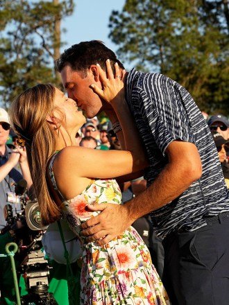 Scottie Scheffler kisses his wife Meredith Scudder after winning the 86th Masters golf tournament, in Augusta, Ga Masters Golf, Augusta, United States - 10 Apr 2022