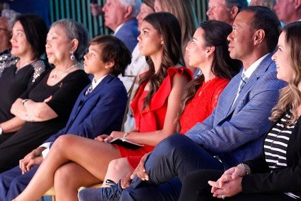 Tiger Woods sits with his family from left; his mother Kultida Woods, son Charlie Woods, daughter Sam Woods and his girlfriend Erica Herman during his induction into the World Golf Hall of Fame, in Ponte Vedra Beach, Fla Hall of Fame Golf, Ponte Vedra Beach, United States - 09 Mar 2022
